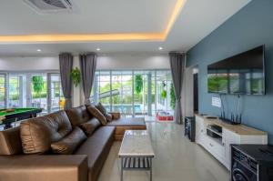 Kuchyň nebo kuchyňský kout v ubytování Aurora Pool Villa Cha-am