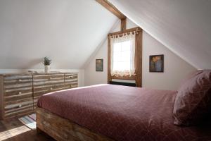 Postel nebo postele na pokoji v ubytování Walnut Tree Cottage
