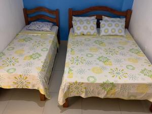 Cama o camas de una habitación en Hostel Morro de Sao Paulo