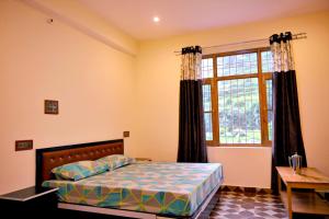 Ένα ή περισσότερα κρεβάτια σε δωμάτιο στο Kareri River Bliss