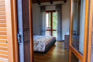 A bed or beds in a room at Casa Lilla 1 e 2