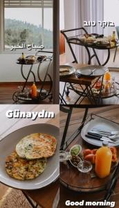 uma mesa com um prato de comida e uma pizza em my dream em ‘Isfiyā