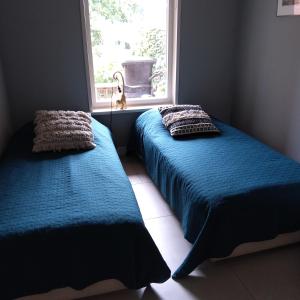 Postel nebo postele na pokoji v ubytování Bed & Breakfast Appartement 't Haventje + 23 fotografií