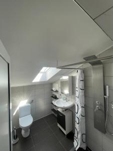 Ett badrum på Apartments villa M&M