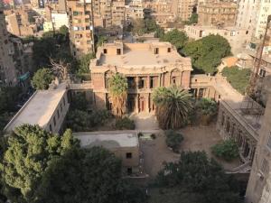 an aerial view of a building in a city at Champollion Hostel in Cairo
