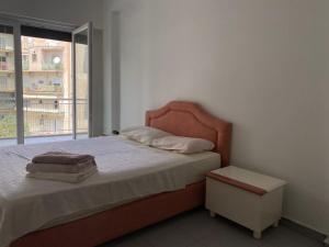 Postel nebo postele na pokoji v ubytování Kipseli Private Rooms