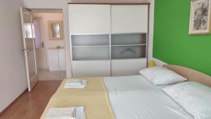 Postel nebo postele na pokoji v ubytování Apartment Marina