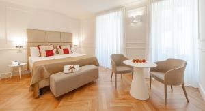 Posteľ alebo postele v izbe v ubytovaní Dei Priori Boutique Hotel