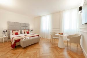 Posteľ alebo postele v izbe v ubytovaní Dei Priori Boutique Hotel