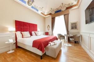 Posteľ alebo postele v izbe v ubytovaní Dei Priori Boutique Hotel