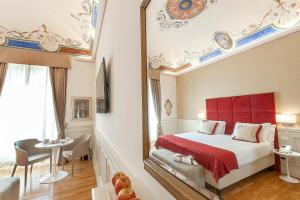 Posteľ alebo postele v izbe v ubytovaní Dei Priori Boutique Hotel