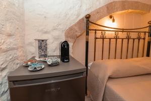 Ένα ή περισσότερα κρεβάτια σε δωμάτιο στο Suite Pietra Bianca - Relax & SPA +12 φωτογραφίες