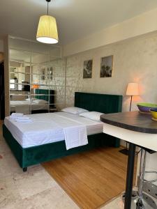 Ліжко або ліжка в номері Green Parhon Copou