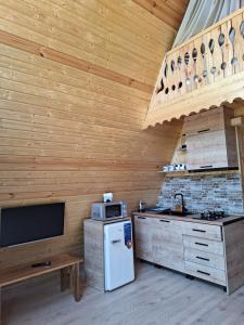 Kuchyň nebo kuchyňský kout v ubytování Paradise cottage + 23 fotografií