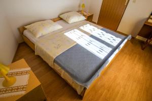 Postel nebo postele na pokoji v ubytování Apartments Žile