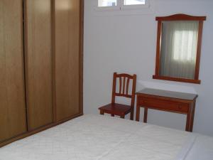 Łóżko lub łóżka w pokoju w obiekcie Hotel Brisa del Mar