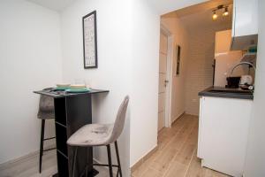Kuchyň nebo kuchyňský kout v ubytování Oasis apartment