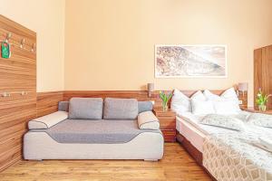 Postel nebo postele na pokoji v ubytování Forum Hotel