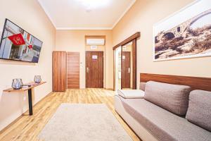 TV a/nebo společenská místnost v ubytování Forum Hotel
