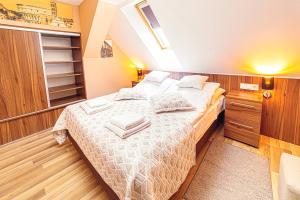 Postel nebo postele na pokoji v ubytování Forum Hotel