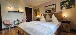 Postel nebo postele na pokoji v ubytování Hotelbetriebe Güldenhaupt GmbH