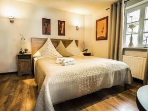 Postel nebo postele na pokoji v ubytování Hotelbetriebe Güldenhaupt GmbH + 37 fotografií