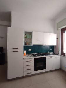 Kuchyň nebo kuchyňský kout v ubytování Cherie House