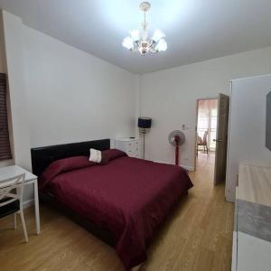 Postel nebo postele na pokoji v ubytování Kalunta hughome Khonkhan