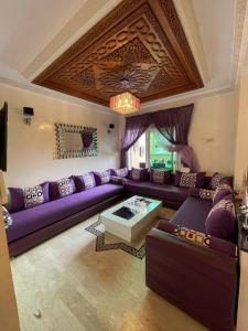 Posezení v ubytování Appartement résidence Al Kawtar