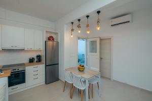 Kuchyň nebo kuchyňský kout v ubytování Loukoum House