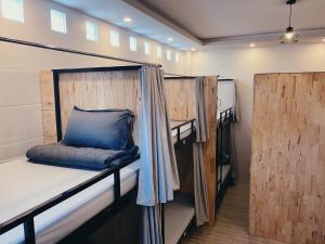 a couple of bunk beds in a room at B Home in Can Tho
