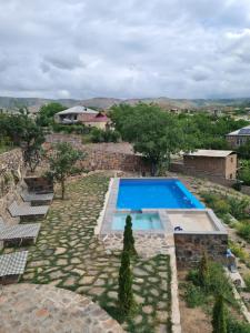 an image of a swimming pool in a yard at NorDar in Garni