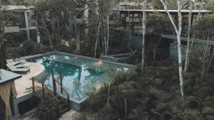 Bazén v ubytování Siwa Tulum Unique Hotel & Spa nebo v jeho okolí