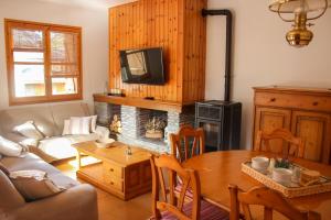 Posedenie v ubytovaní Apartament Montsent