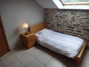 Llit o llits en una habitació de Holiday home Gîte rural Côté Fagnes