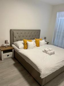 Postel nebo postele na pokoji v ubytování Aqua Relax apartman