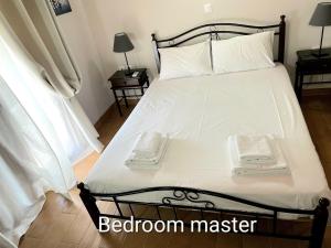 Postel nebo postele na pokoji v ubytování Villa MARGIANI