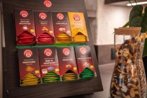 a display of chocolates on a shelf in a store at Hotel Monte44 in Selva di Val Gardena