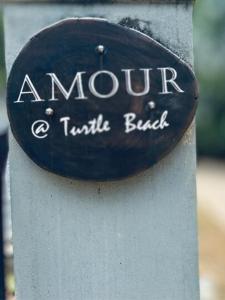 Majutusasutuses AMOUR AT TURTLE BEACH olev sertifikaat, autasu, silt või muu dokument