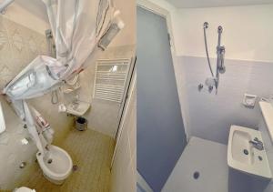 a bathroom with a shower and a toilet and a sink at Hotel Morri in Bellaria-Igea Marina +42 photos