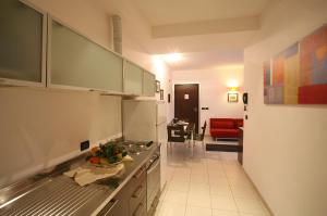 Kuchyňa alebo kuchynka v ubytovaní Residence Domus