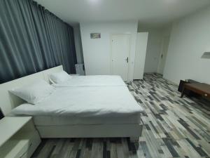 Katil atau katil-katil dalam bilik di Hotel Diana