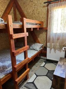 Postel nebo postele na pokoji v ubytování Vikendica Marković