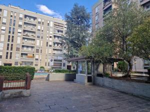 a pavilion in a city with buildings in the background at A casa di Cippi in Rome