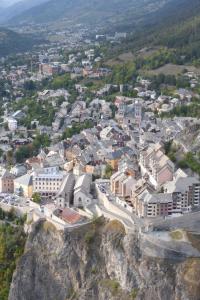 an aerial view of a town on a mountain at Au cœur de la Cité Vauban in Briançon