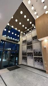 a building with a bunch of wine racks at Warsaw Home Suites in Warsaw