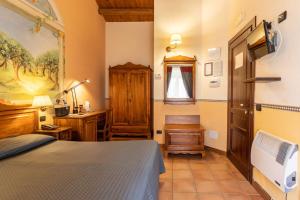 Letto o letti in una camera di Hotel Il Barocco