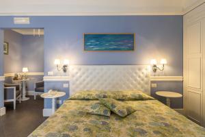 Letto o letti in una camera di Hotel Il Barocco