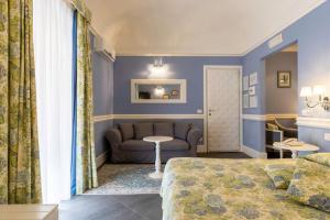 Letto o letti in una camera di Hotel Il Barocco