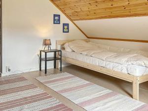 Ένα ή περισσότερα κρεβάτια σε δωμάτιο στο Holiday home Hedekas III